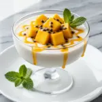 dairy-free coconut mango panna cotta - featured image